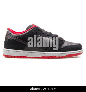 VIENNA, AUSTRIA - AUGUST 25, 2017: Nike Dunk Low Pro SB black, grey and red sneaker on white background. Stock Photo