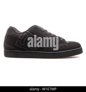 VIENNA, AUSTRIA - AUGUST 25, 2017: DC Net black sneaker on white background. Stock Photo