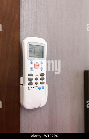 Air conditioning thermostat controller unit. Stock Photo