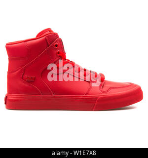 VIENNA, AUSTRIA - AUGUST 25, 2017: Supra Vaider red sneaker on white background. Stock Photo