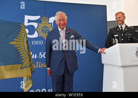 The Prince of Wales delivers a speech during a visit to the South Wales Police Headquarters to celebrate their 50th anniversary and meet officers from various units. Stock Photo