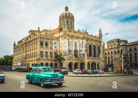 Old classic car and The former Presidential Palace, The Museum of the Revolution in Old Havana, Cuba, West Indies, Caribbean, Central America Stock Photo