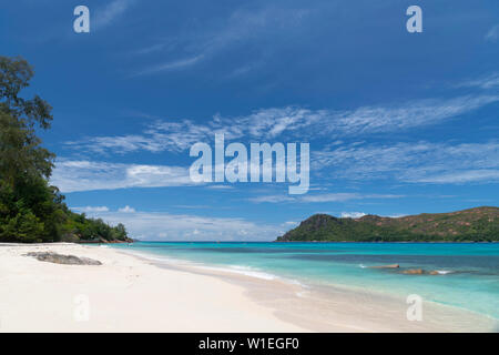 A view along Anse Boudin toward Curieuse Island from Praslin, Seychelles, Indian Ocean, Africa Stock Photo