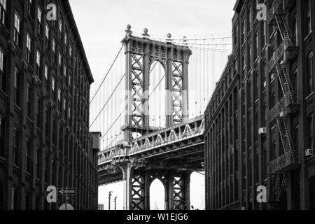 Manhattan Bridge with the Empire State Building through the Arches, New York City, New York, United States of America, North America