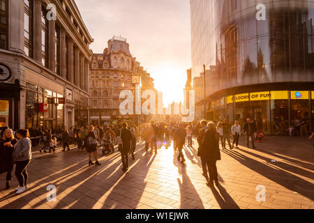 Leicester Street with Swiss Glockenspiel and backlight in late afternoon, London, England, United Kingdom, Europe Stock Photo