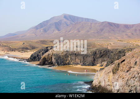 View along coast from cliff top above Playa del Papagayo, Playa Blanca, Yaiza, Lanzarote, Las Palmas Province, Canary Islands, Spain, Atlantic, Europe Stock Photo