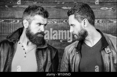 Confident competitors strict glance. Masculinity concept. Masculinity attributes. Brutality confidence and masculinity interconnection. True man temper. Men brutal bearded hipster. Exude masculinity. Stock Photo