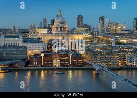 St. Pauls Cathedral and the Millennium Bridge over the River Thames from Tate Switch, London, England, United Kingdom, Europe Stock Photo