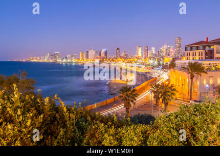 View of Tel Aviv from Jaffa Old Town at dusk, Tel Aviv, Israel, Middle East