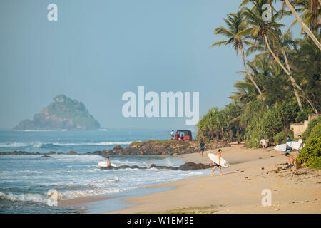 Surfing, Weligama Bay, South Coast, Sri Lanka, Asia Stock Photo