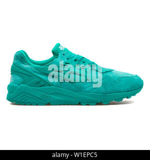VIENNA, AUSTRIA - AUGUST 10, 2017: Asics Gel Kayano Trainer green sneaker on white background. Stock Photo