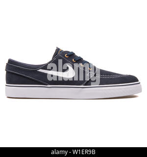 VIENNA, AUSTRIA - AUGUST 10, 2017: Nike Zoom Stefan Janoski dark obsidian, brown and white sneaker on white background. Stock Photo