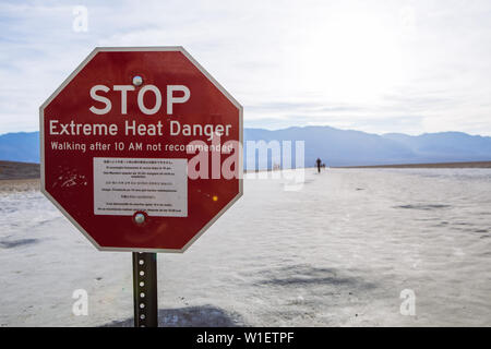 Stop Extreme Heat Danger sign in Badwater basin, endorheic basin, Death Valley National Park, Inyo, California, USA Stock Photo