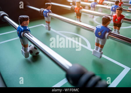 Close-up of Table football soccer game on green field (game that requires a hand flick) Stock Photo