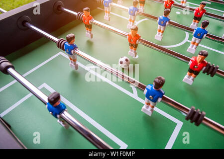 Close-up of Table football soccer game on green field (game that requires a hand flick) Stock Photo