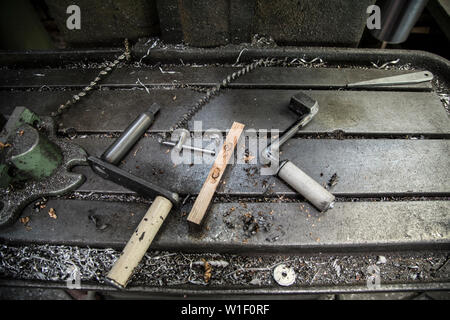 Hand tools on workshop table Stock Photo