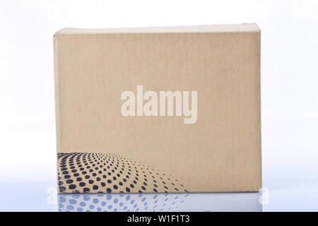 A cardboard box isolated on white background. Stock Photo