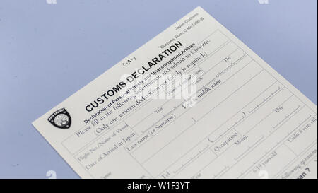 Japanese customs declaration form at airport counter Stock Photo