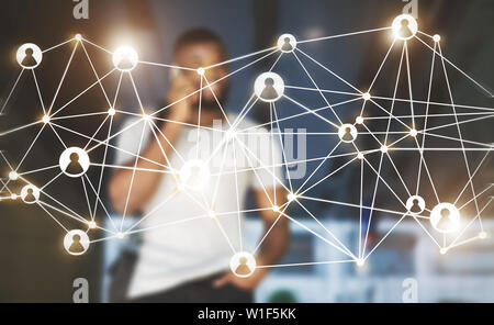 Virtual diagram of people connection and black man talking on phone Stock Photo