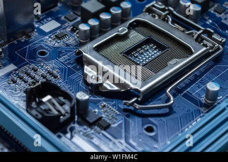Motherboard with a processor socket and electronic components Stock Photo