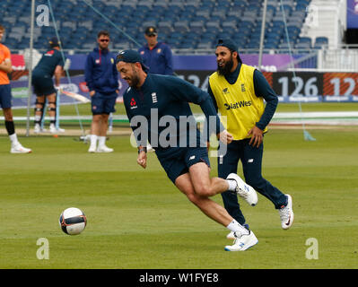 Emirates Riverside, Chester-le-Street, Durham, UK. 2nd July, 2019. ICC World Cup Cricket, Training and Press conferences, Liam Plunkett goes past Adil Rashid as they play football during England's training session this afternoon ahead of tomorrow's final group stage match versus New Zealand Credit: Action Plus Sports/Alamy Live News Stock Photo