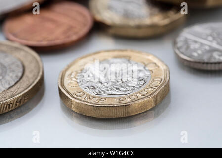 British coins, loose change,showing both £1 and £2 coins and smaller denominations. Stock Photo