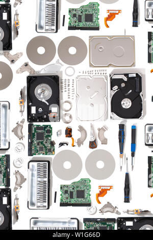 Disassembled hdd drive parts isolated on a white background. Stock Photo