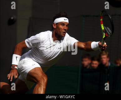 London, UK. 02nd July, 2019. Wimbledon, 2 July 2019 - Spain's Rafael Nadal in action against Yuichi Sugita during thier first round match at Wimbledon today. Nadal won the match in straight sets. Credit: Adam Stoltman/Alamy Live News Stock Photo