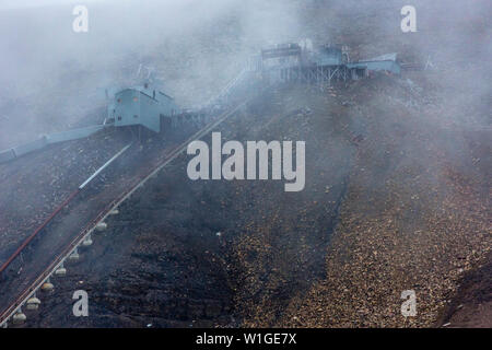 abandoned coal mine number 5 at svalbard, coal lie around the mountains, Longyearbyen, Svalbard, Norway. Stock Photo