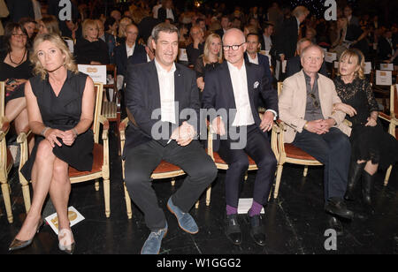 Munich, Germany. 02nd July, 2019. Iris Ostermaier (l-r), Managing Director of Bavaria Film, Markus Söder (CSU), Prime Minister of Bavaria, Christian Franckenstein, Chairman of the Management Board of Bavaria Film GmbH, and director Wolfgang Petersen with his wife Maria will attend a reception at the media location Geiselgasteig at the Bavaria Film Fest. The Munich Film Festival takes place from 27.06.2019 to 06.07.2019. Credit: Felix Hörhager/dpa/Alamy Live News Stock Photo