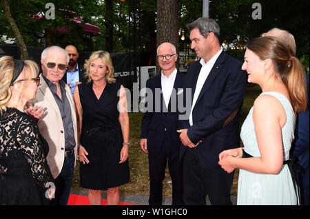 Munich, Germany. 02nd July, 2019. Wolfgang Petersen (l-r), director, and his wife Maria (r), Iris Ostermaier, Managing Director of Bavaria Film, Christian Franckenstein, Chairman of the Board of Bavaria Film GmbH, Markus Söder (CSU), Prime Minister of Bavaria, Tom Buhrow (concealed), WDR Director-General, and the Bavarian Minister of State for Digital Affairs, Judith Gerlach, come to the Bavaria Film Fest reception over the red carpet at the media location Geiselgasteig. The Munich Film Festival takes place from 27.06.2019 to 06.07.2019. Credit: Felix Hörhager/dpa/Alamy Live News Stock Photo