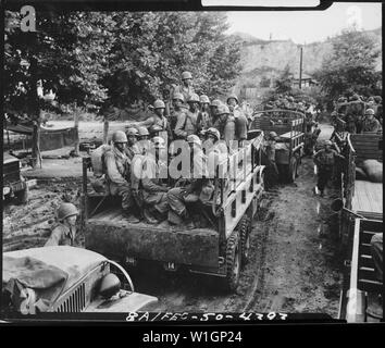 Men of the 24th Infantry Regiment move up to the front line in Korea ...