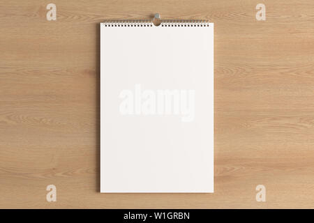 Blank vertical calendar mock up on the wooden wall. 3d illustration Stock Photo