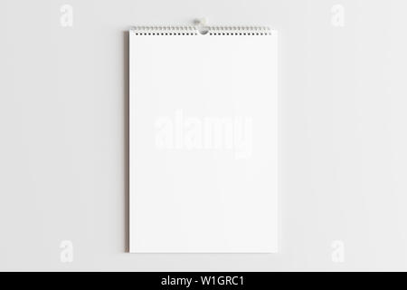 Blank vertical calendar mock up on the white wall. 3d illustration Stock Photo