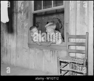 Miners' children. Kentucky Straight Creek Coal Company, Belva Mine, abandoned after explosion [in] Dec. 1945, Four Mile, Bell County, Kentucky. Stock Photo