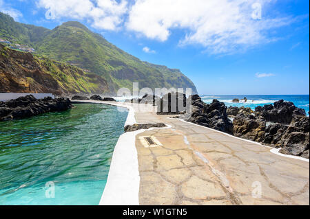 Natural volcanic swimming lagoon pools at Porto Moniz, travel destination for vacation, Madeira island, Portugal Stock Photo