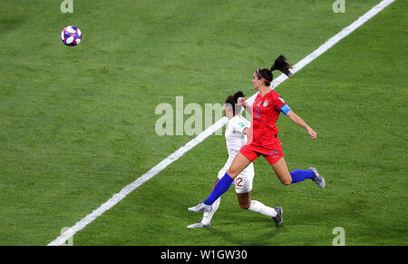 USA's Alex Morgan scores her side's second goal of the game during the FIFA Women's World Cup Semi Final match at the Stade de Lyon. Stock Photo