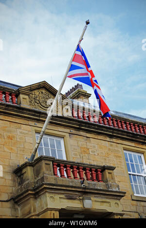 The British Flag flies on the front of Brierfield Town Hall Stock Photo