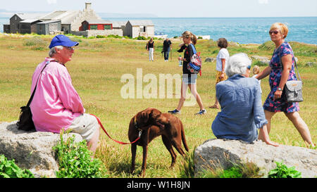 Portland, Dorset. 2nd July 2019. UK Weather: People make the most of a gorgeous day at Portland Bill, before the expected change in the weather. credit:  stuart fretwell/Alamy Live News Stock Photo