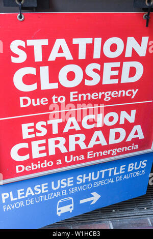 Miami Florida,Civic Center Metrorail Station,mass transit,public transportation,elevated rail system,sign,logo,emergency closing,shuttle,bilingual,Spa Stock Photo
