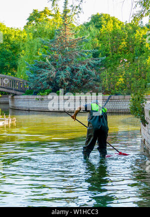 Cleaning pond nets hi-res stock photography and images - Alamy