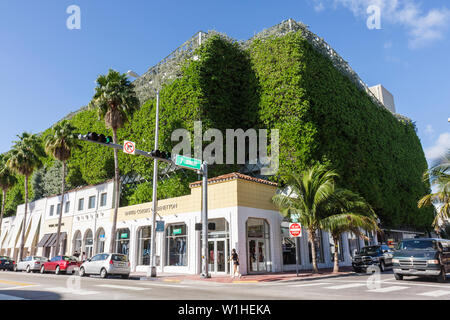 Miami Beach Florida,Collins Avenue,parking garage,Seventh 7th Street Parking Garage,multi use building,shops,vertical vegetated wall,urban landscape,p Stock Photo
