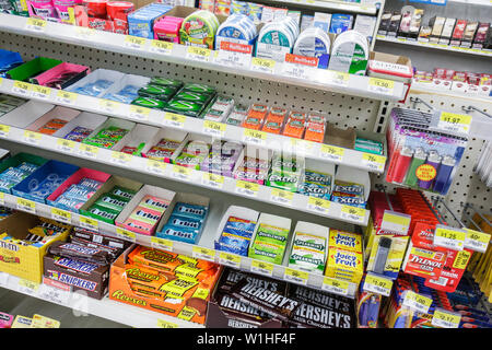 Naples Florida,Walmart Big-Box,global company,chain,discount department store,retail,checkout aisle,gum,mint,chocolate bar bars,packaging,competition, Stock Photo