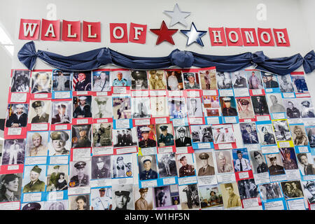 Naples Florida,Walmart,global company,chain,discount department store,Wall of Honor,military,tribute,soldier,photograph,community support,FL091018053 Stock Photo