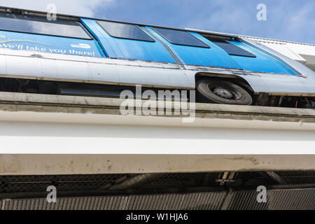 Miami Florida,Omni Loop,Metromover,public transportation,mass transit,automated people mover,train cart,elevated track,view from underneath,visitors t Stock Photo