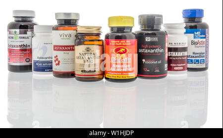 Winneconne, WI - 27 May 2019 : A collection of Astaxanthin supplements on an isolated background Stock Photo