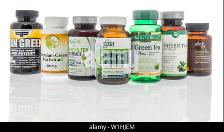 Winneconne, WI - 27 May 2019 : A collection of  Green Tea supplements on an isolated background Stock Photo