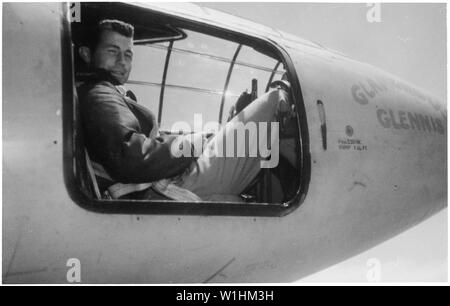 Photograph of Captain Charles E. Yeager; Scope and content:  Original caption: Captain Charles E. Yeager, the Air Force pilot who was the first man to fly faster than the speed of sound, sits in the cockpit of the Bell X-1 supersonic research aircraft. Stock Photo