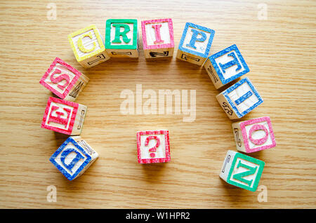 Educational toy cubes with letters organised to display word DESCRIPTION - editing metadata and Search engine optimisation concept Stock Photo
