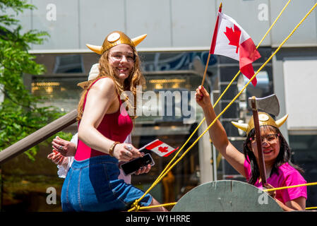 The parade of Canadian National Day in downtown Montreal Stock Photo